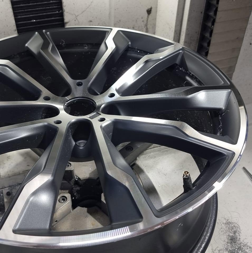 Close-up of a finished painted diamond-cut wheel